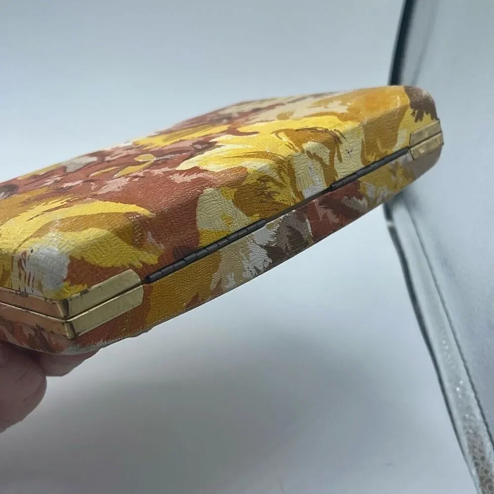 Vintage 70’s pierced earrings case. Golden rod floral print.